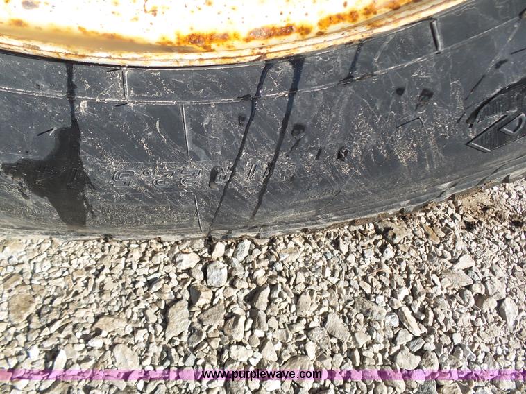 image for item K1311 1998 Ford L8501 Louisville 101 flatbed truck