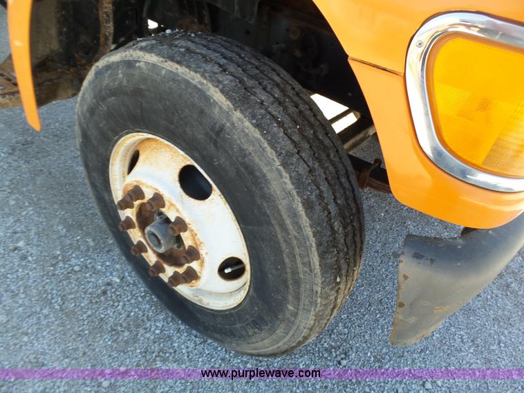 image for item K1311 1998 Ford L8501 Louisville 101 flatbed truck