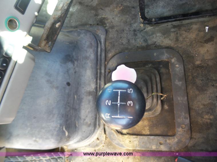 image for item K1311 1998 Ford L8501 Louisville 101 flatbed truck