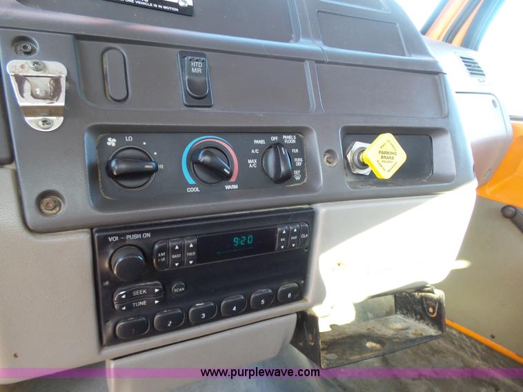 image for item K1311 1998 Ford L8501 Louisville 101 flatbed truck