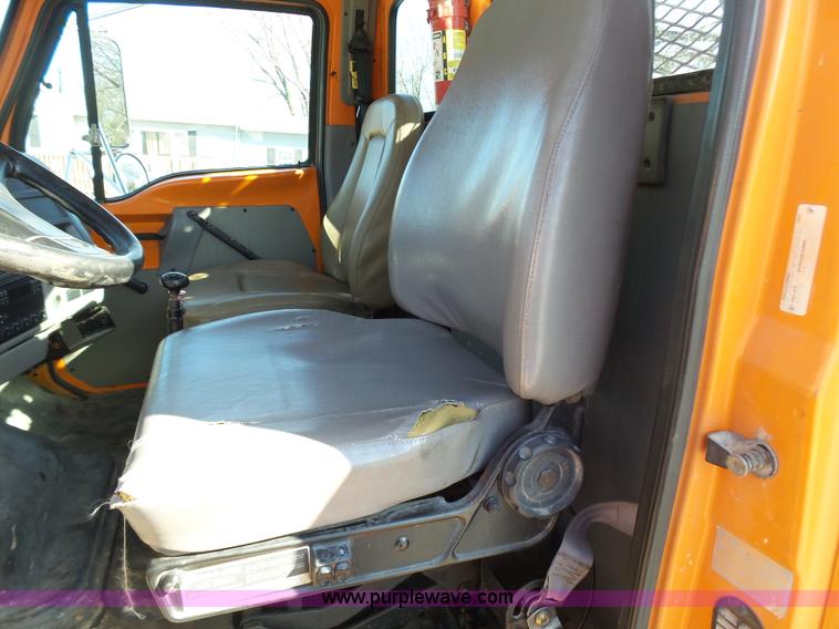 image for item K1311 1998 Ford L8501 Louisville 101 flatbed truck