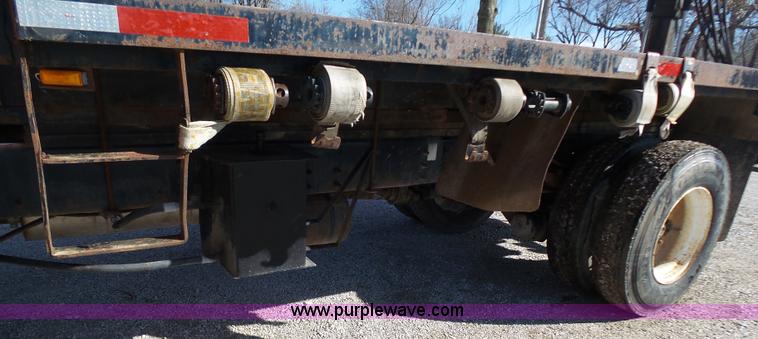 image for item K1311 1998 Ford L8501 Louisville 101 flatbed truck