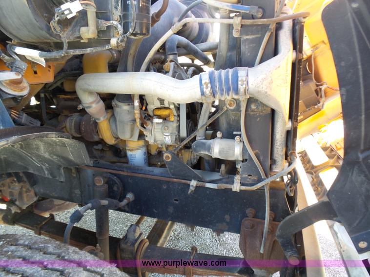 image for item K1311 1998 Ford L8501 Louisville 101 flatbed truck