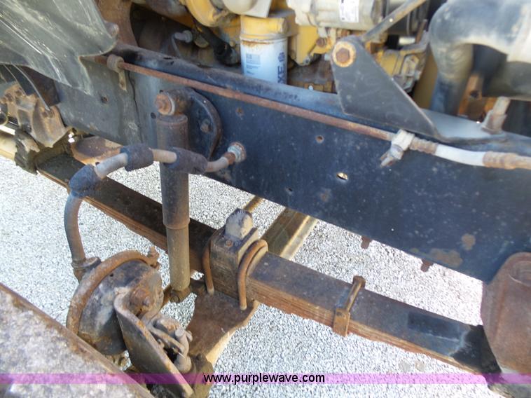 image for item K1311 1998 Ford L8501 Louisville 101 flatbed truck