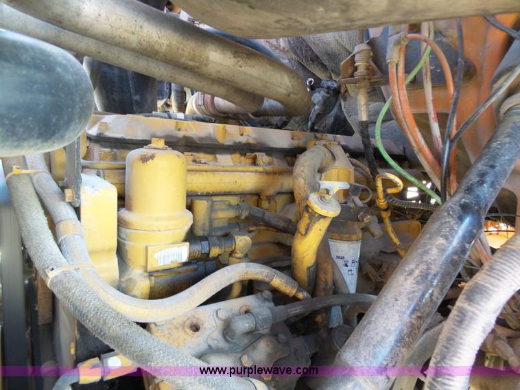 image for item K1311 1998 Ford L8501 Louisville 101 flatbed truck