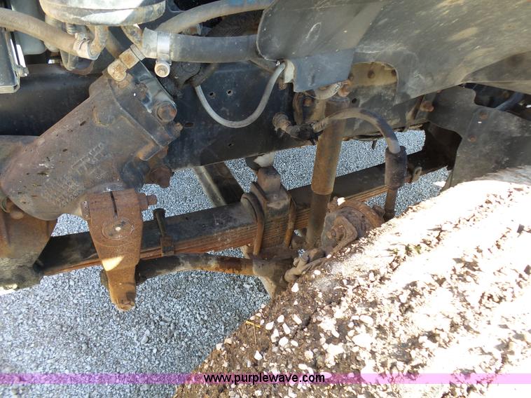 image for item K1311 1998 Ford L8501 Louisville 101 flatbed truck