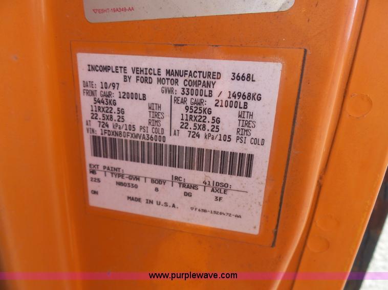 image for item K1311 1998 Ford L8501 Louisville 101 flatbed truck