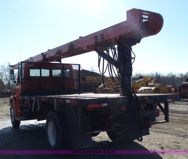 image for item K1312 1998 Freightliner FL70 flatbed truck