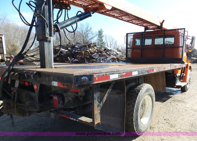 image for item K1312 1998 Freightliner FL70 flatbed truck