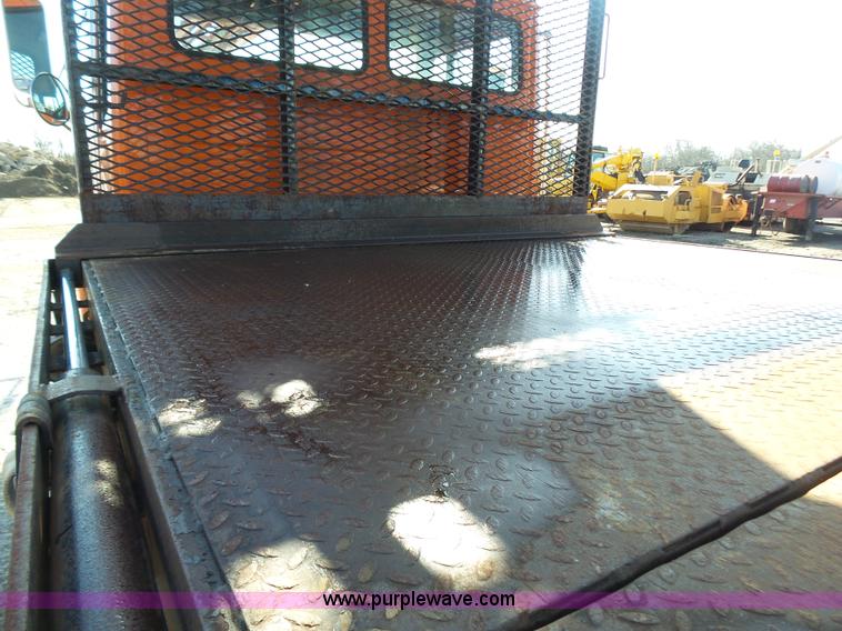 image for item K1312 1998 Freightliner FL70 flatbed truck