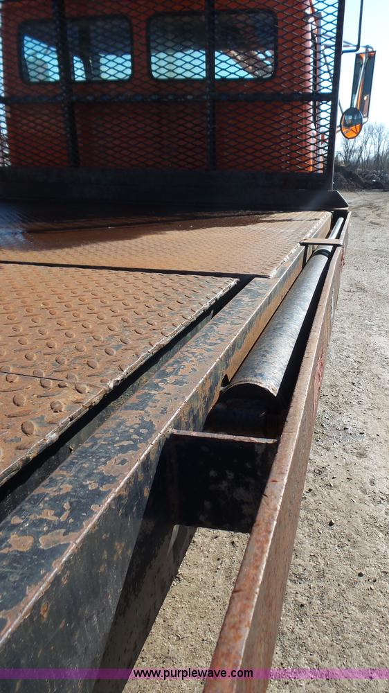 image for item K1312 1998 Freightliner FL70 flatbed truck