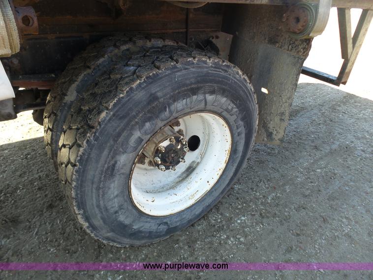 image for item K1312 1998 Freightliner FL70 flatbed truck