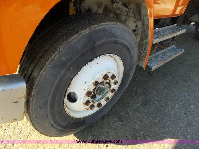 image for item K1312 1998 Freightliner FL70 flatbed truck