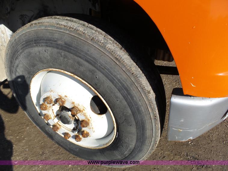 image for item K1312 1998 Freightliner FL70 flatbed truck