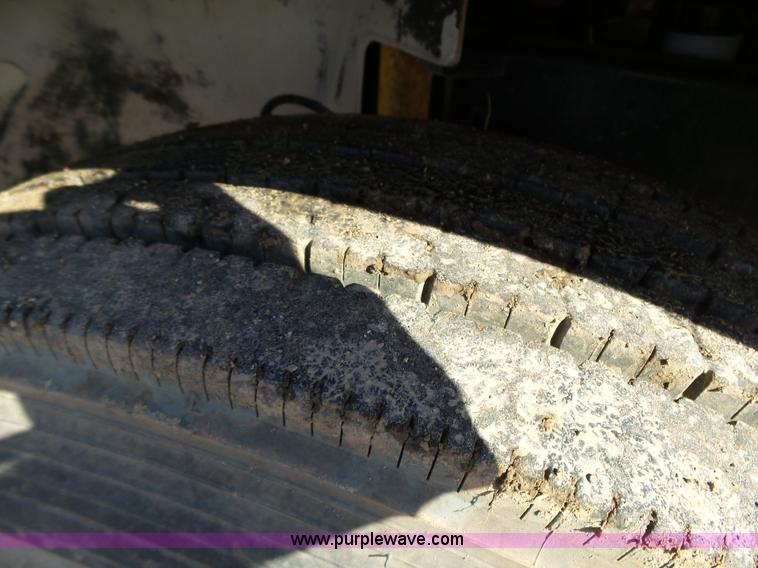 image for item K1312 1998 Freightliner FL70 flatbed truck