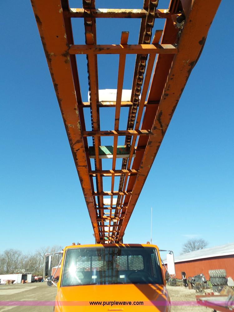 image for item K1312 1998 Freightliner FL70 flatbed truck