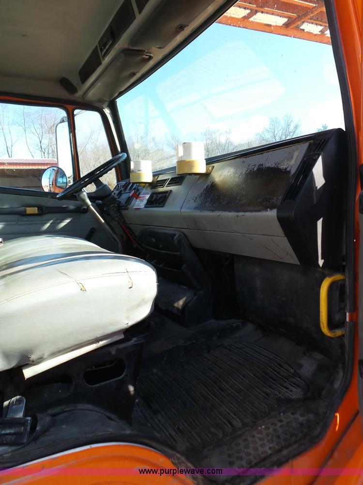 image for item K1312 1998 Freightliner FL70 flatbed truck