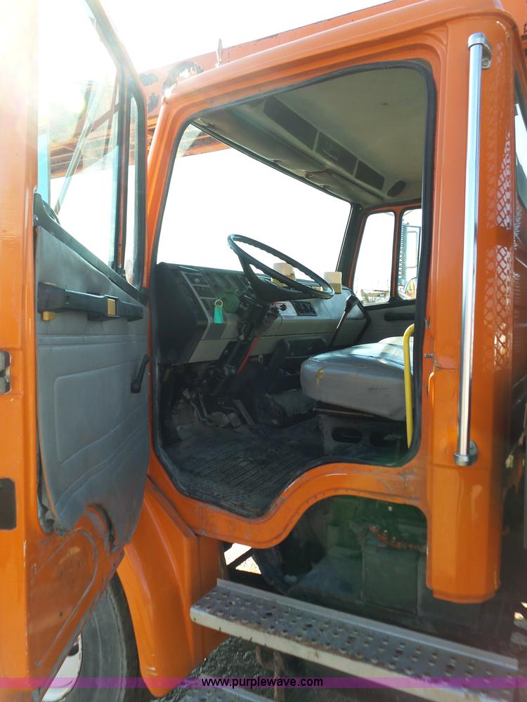 image for item K1312 1998 Freightliner FL70 flatbed truck