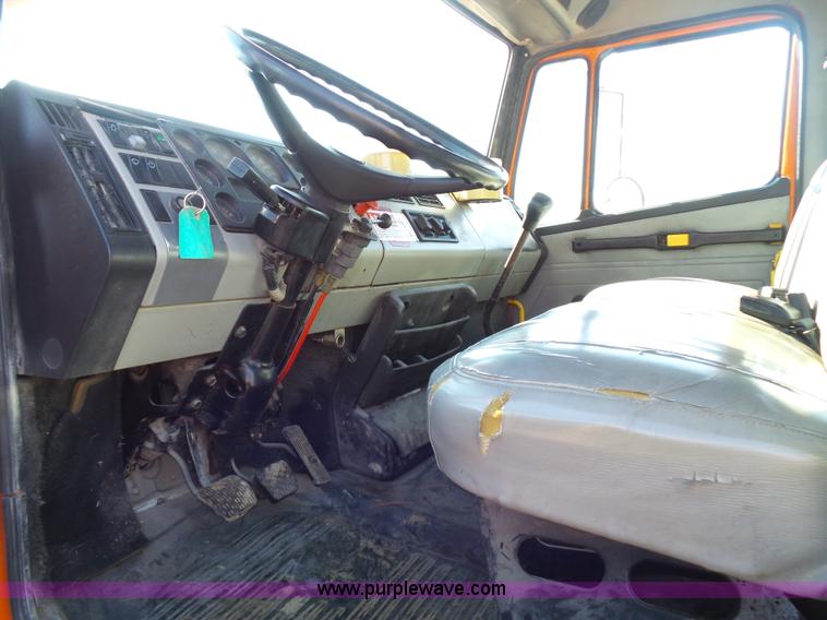 image for item K1312 1998 Freightliner FL70 flatbed truck