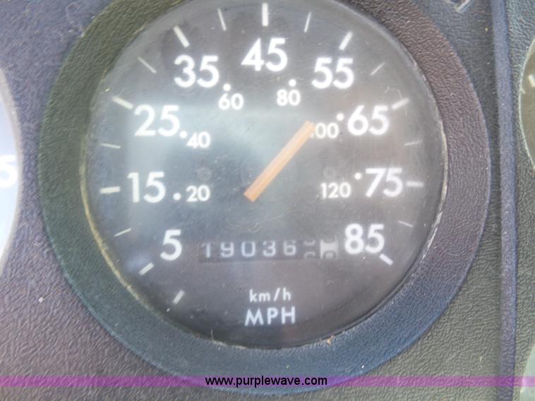 image for item K1312 1998 Freightliner FL70 flatbed truck