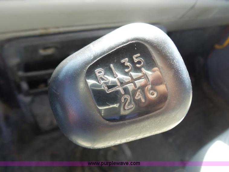 image for item K1312 1998 Freightliner FL70 flatbed truck