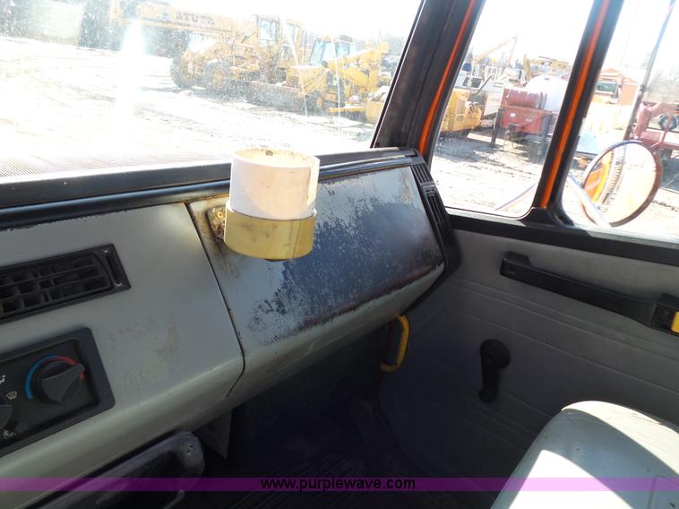 image for item K1312 1998 Freightliner FL70 flatbed truck