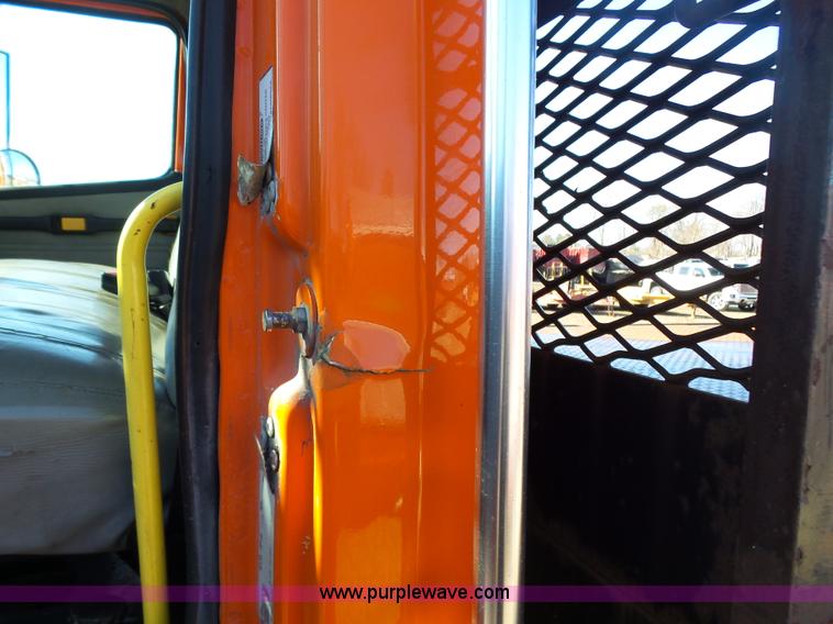 image for item K1312 1998 Freightliner FL70 flatbed truck