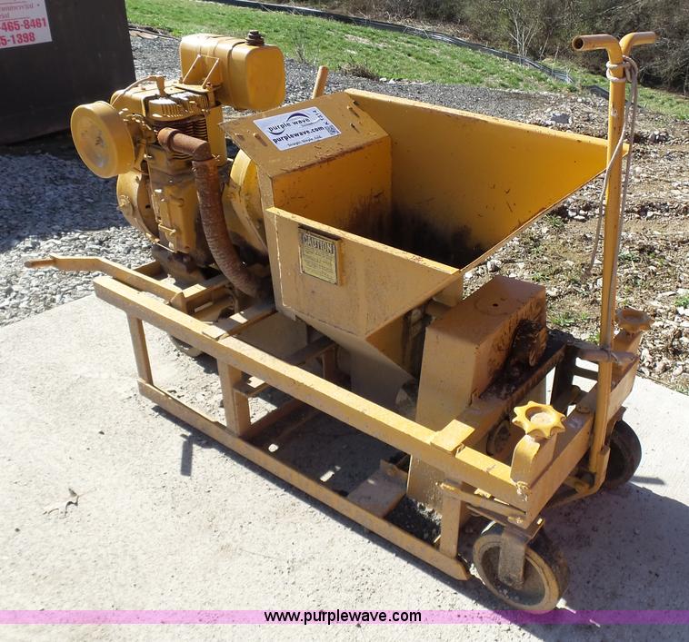 image for item K1314 E.D. Etnyre curb machine