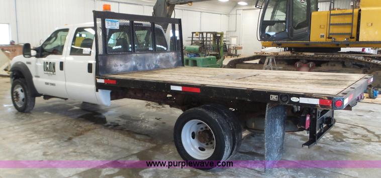 image for item K3493 2007 Ford F550 Super Duty Crew Cab flatbed truck