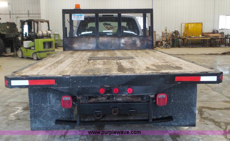 image for item K3493 2007 Ford F550 Super Duty Crew Cab flatbed truck