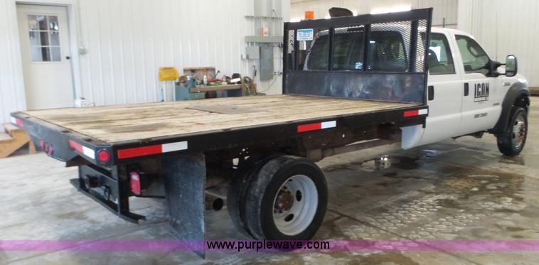 image for item K3493 2007 Ford F550 Super Duty Crew Cab flatbed truck