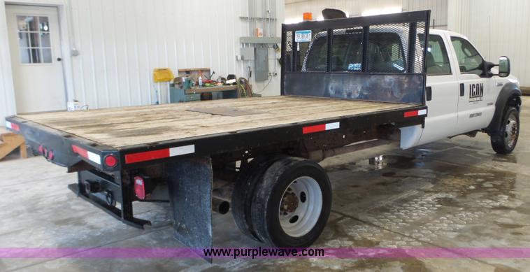 image for item K3493 2007 Ford F550 Super Duty Crew Cab flatbed truck