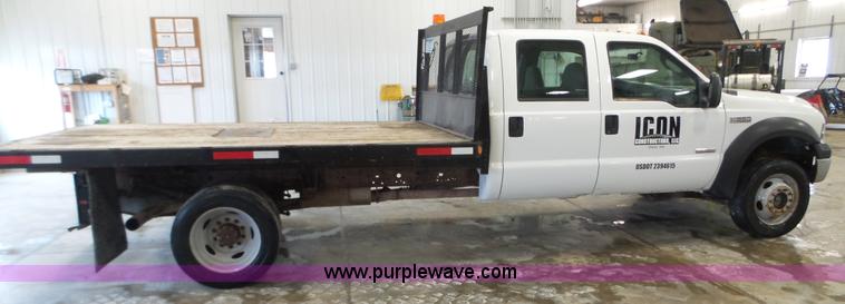 image for item K3493 2007 Ford F550 Super Duty Crew Cab flatbed truck