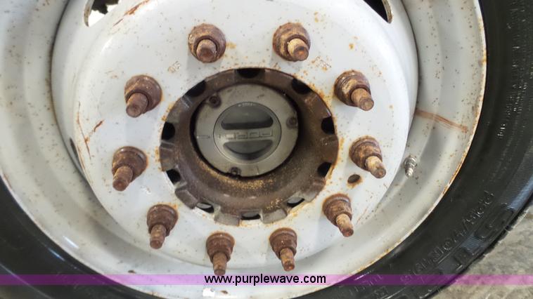 image for item K3493 2007 Ford F550 Super Duty Crew Cab flatbed truck