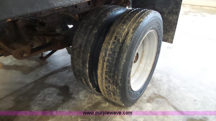 image for item K3493 2007 Ford F550 Super Duty Crew Cab flatbed truck