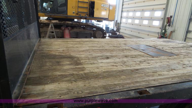 image for item K3493 2007 Ford F550 Super Duty Crew Cab flatbed truck