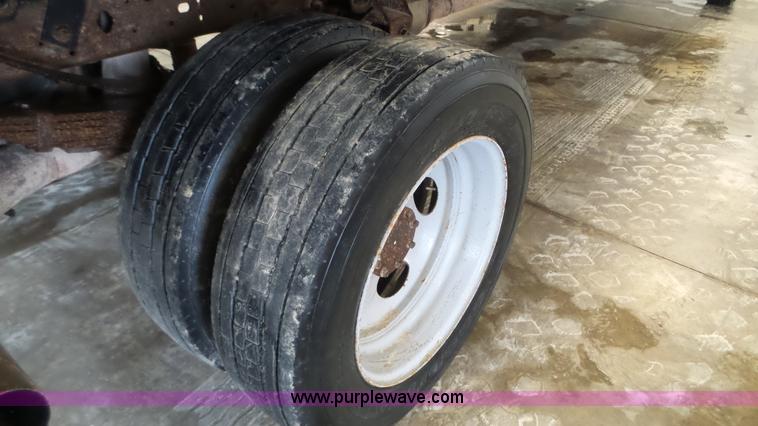 image for item K3493 2007 Ford F550 Super Duty Crew Cab flatbed truck