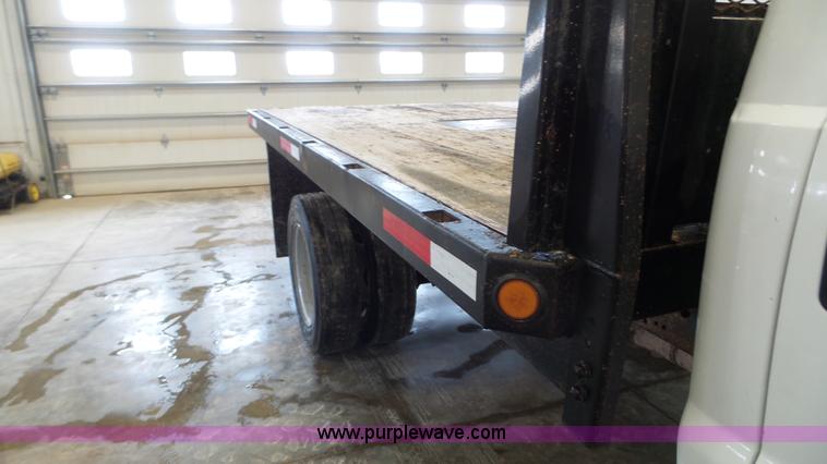 image for item K3493 2007 Ford F550 Super Duty Crew Cab flatbed truck