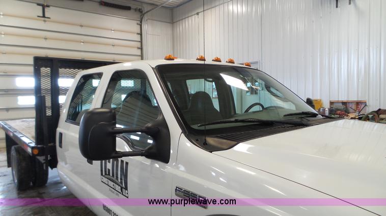 image for item K3493 2007 Ford F550 Super Duty Crew Cab flatbed truck