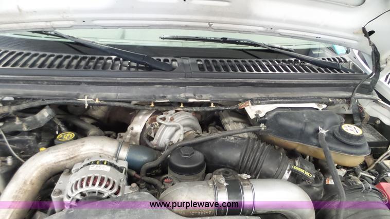 image for item K3493 2007 Ford F550 Super Duty Crew Cab flatbed truck