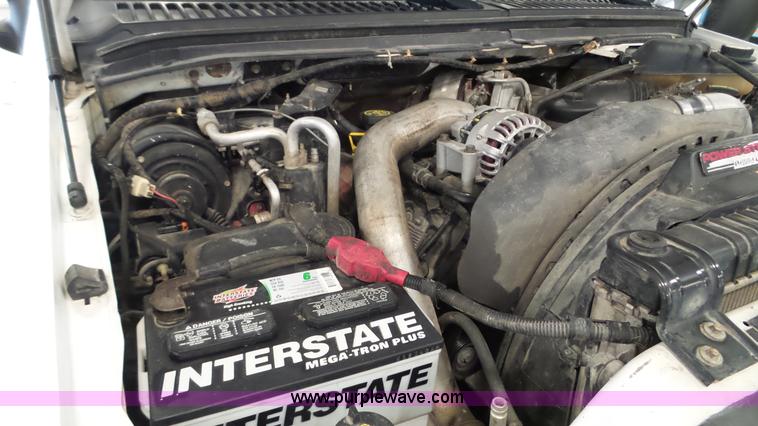 image for item K3493 2007 Ford F550 Super Duty Crew Cab flatbed truck