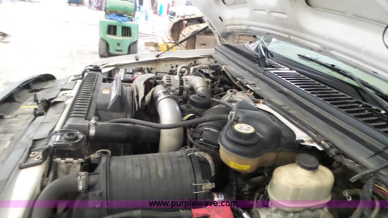 image for item K3493 2007 Ford F550 Super Duty Crew Cab flatbed truck