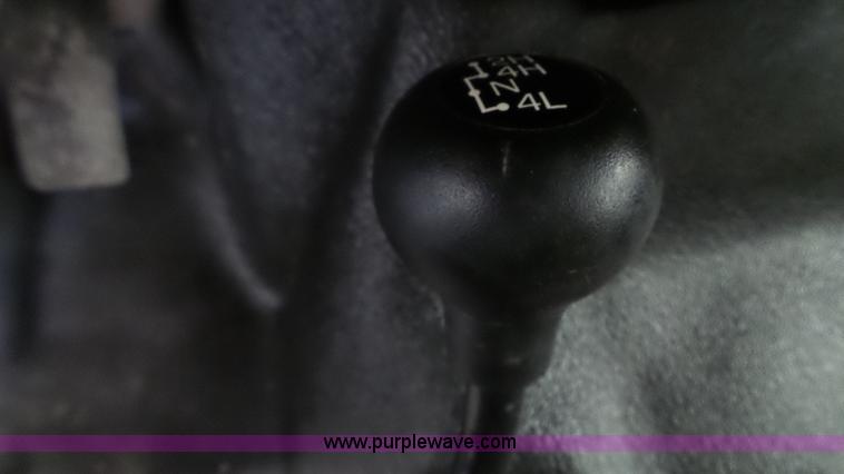 image for item K3493 2007 Ford F550 Super Duty Crew Cab flatbed truck