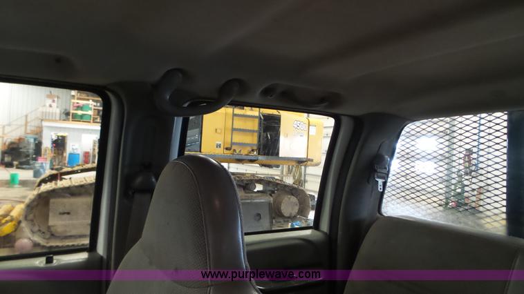 image for item K3493 2007 Ford F550 Super Duty Crew Cab flatbed truck