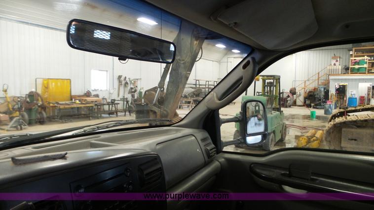 image for item K3493 2007 Ford F550 Super Duty Crew Cab flatbed truck