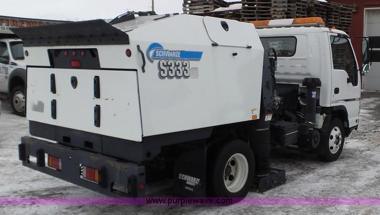image for item L3923 2006 GMC W3500 sweeper truck