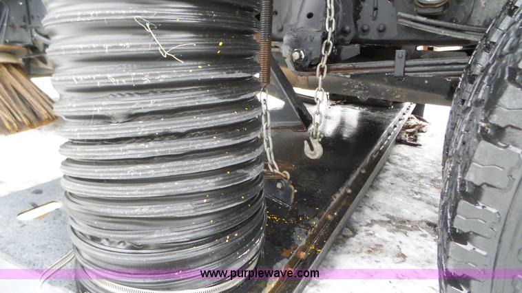 image for item L3923 2006 GMC W3500 sweeper truck