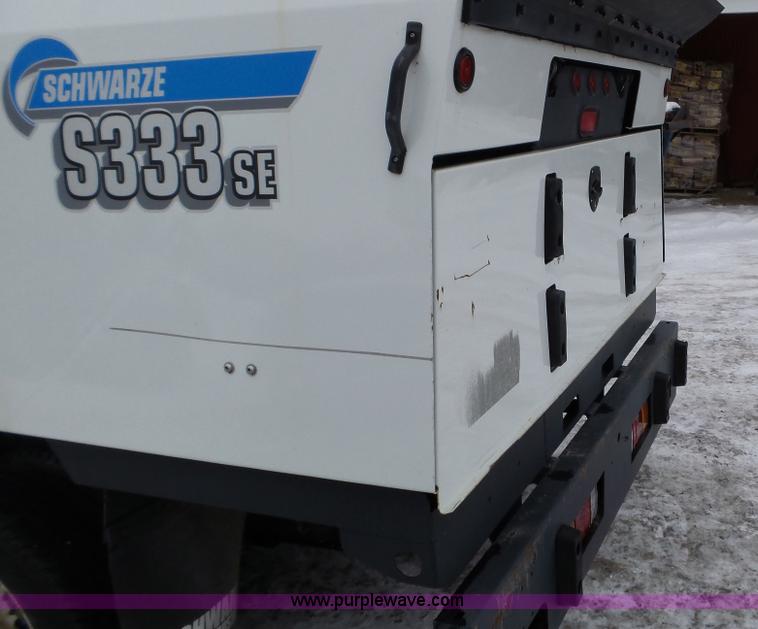 image for item L3923 2006 GMC W3500 sweeper truck