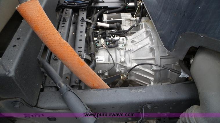 image for item L3923 2006 GMC W3500 sweeper truck