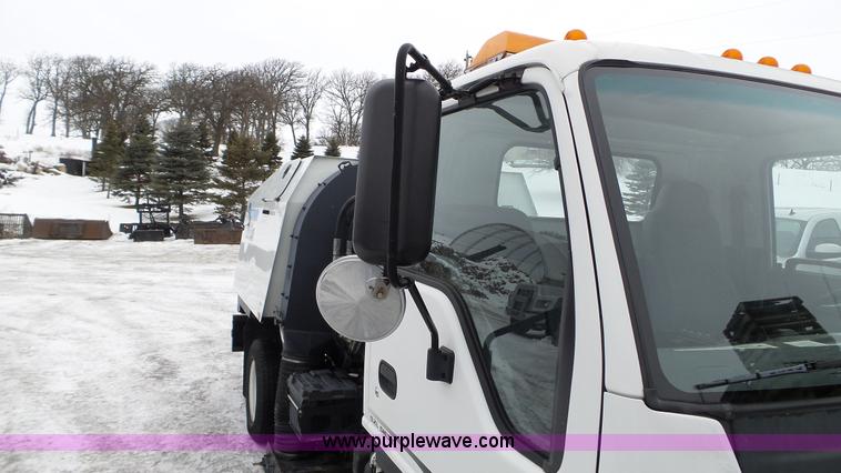 image for item L3923 2006 GMC W3500 sweeper truck